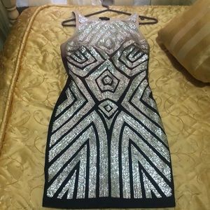 EUC Bebe sequence mini dress with open back
